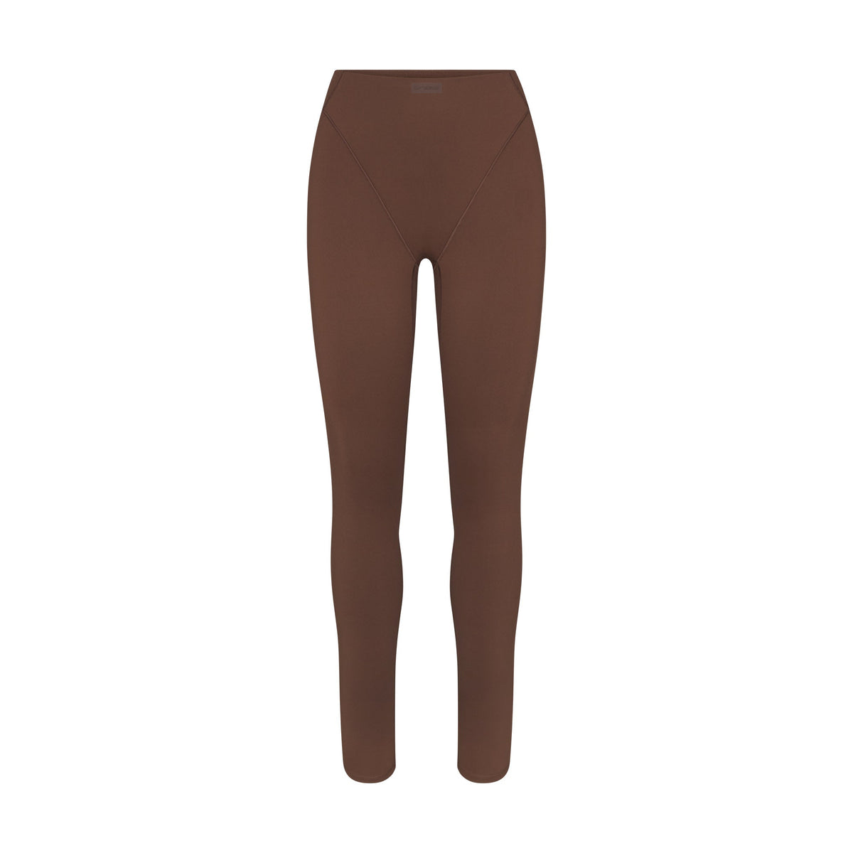 NikeSKIMS MATTE V-LINE 26" LEGGING | DARK SEPIA FLAT ON A WHITE BACKGROUND | FLT
