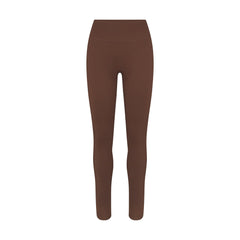 NikeSKIMS MATTE 29" LEGGING | DARK SEPIA FLAT ON A WHITE BACKGROUND | FLT