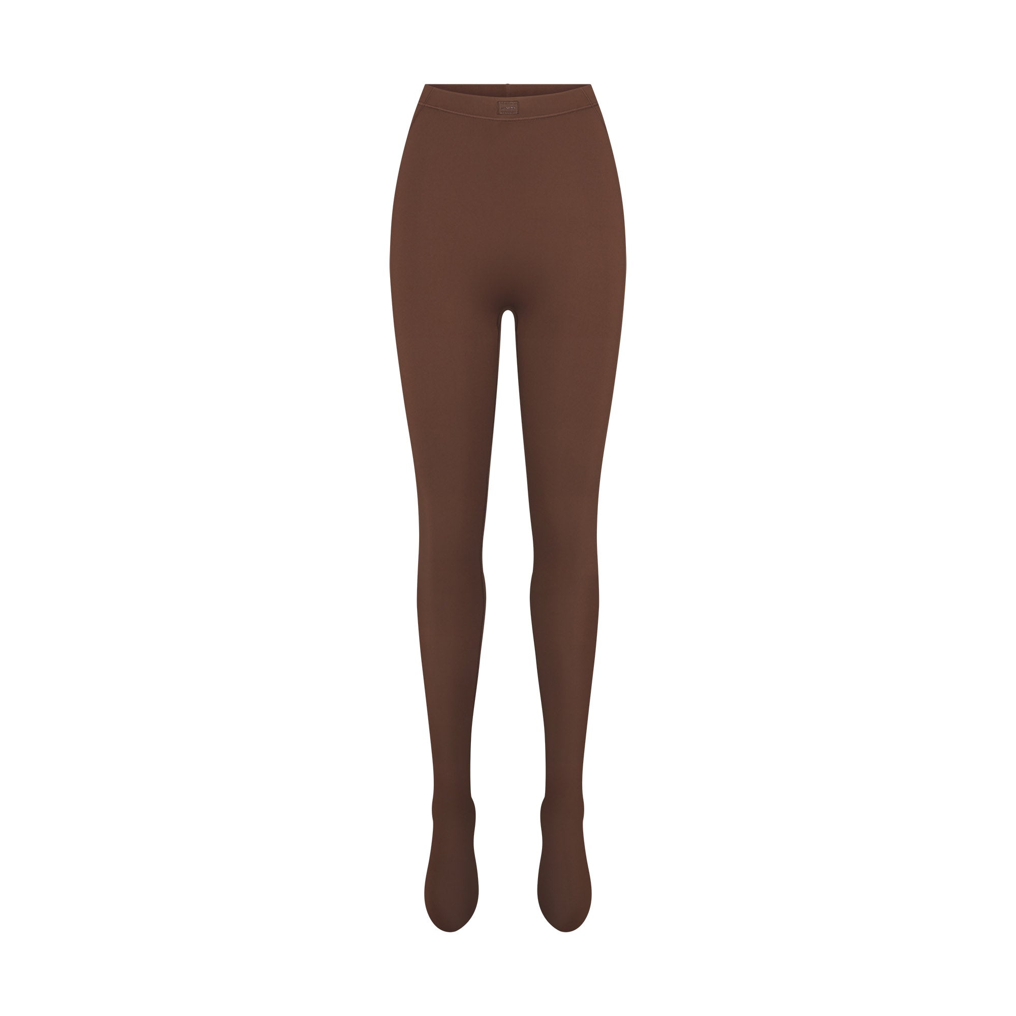 NikeSKIMS MATTE FOOTSIE GRIP LEGGING | DARK SEPIA FLAT ON A WHITE BACKGROUND | FLT