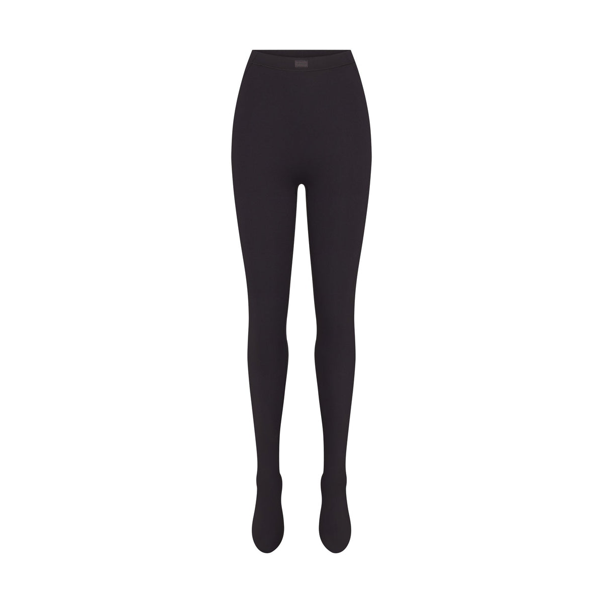 NikeSKIMS MATTE FOOTSIE GRIP LEGGING | OBSIDIAN FLAT ON A WHITE BACKGROUND | FLT