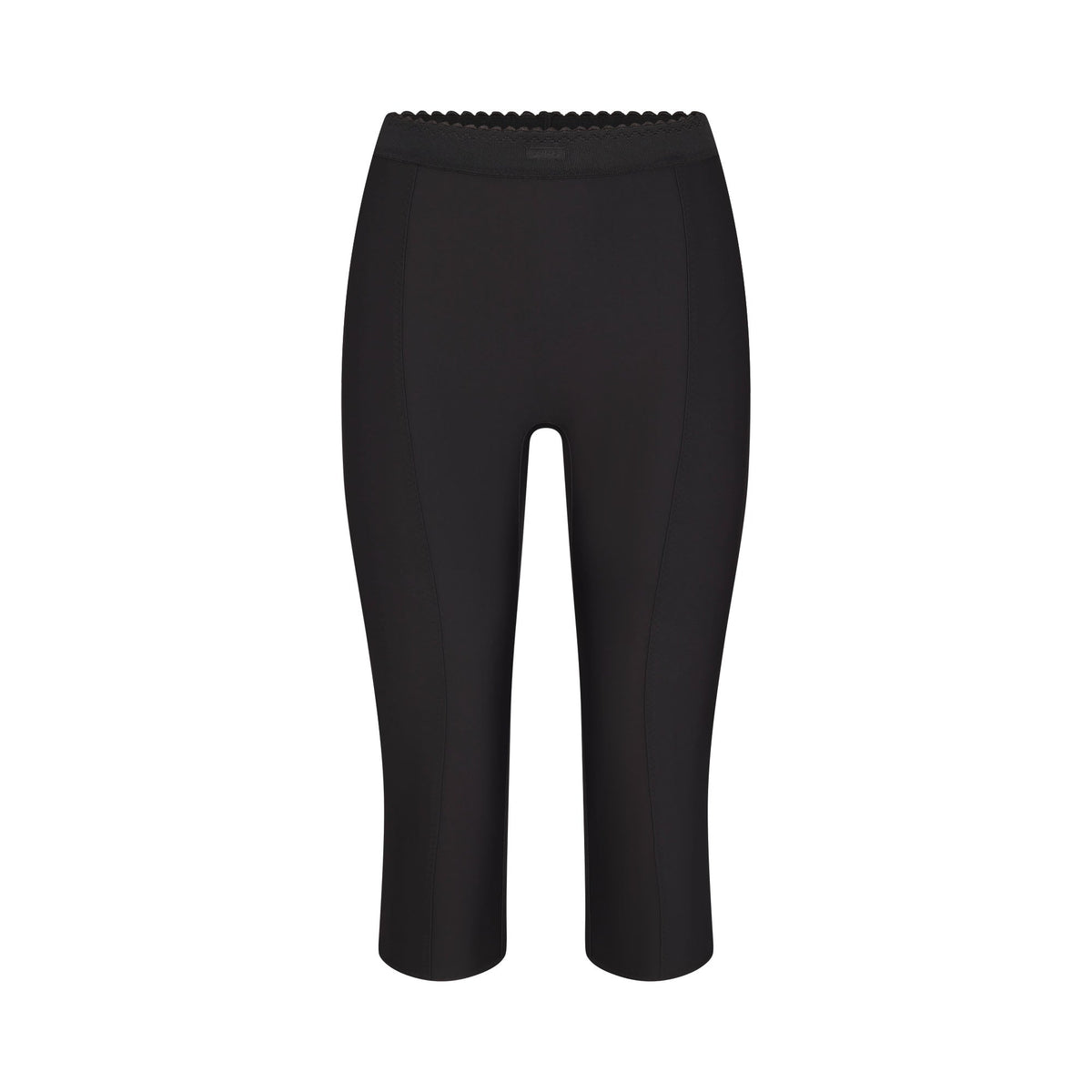 SKIMS BODY HIGH-WAISTED CAPRI | ONYX FLAT ON A WHITE BACKGROUND | FLT