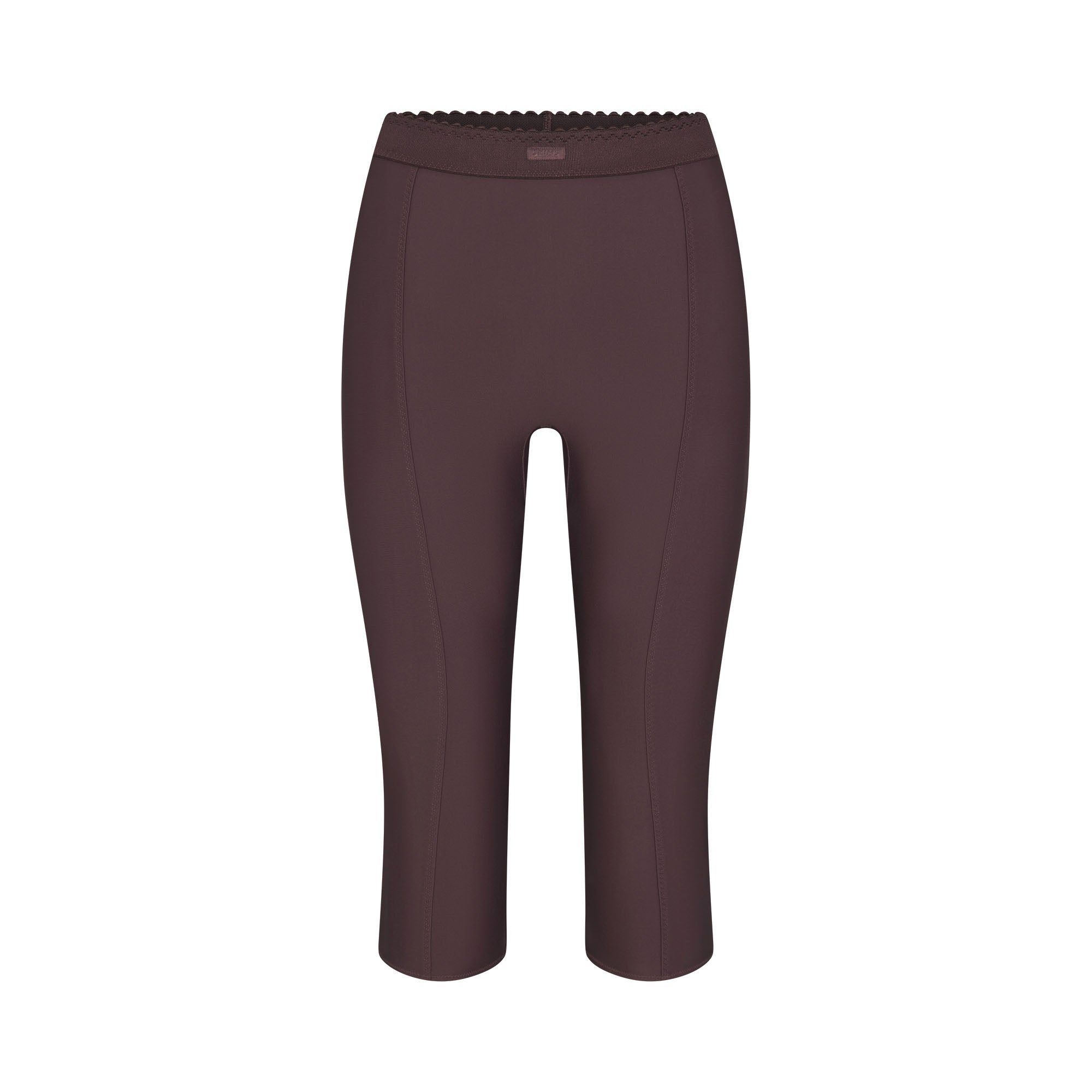 SKIMS BODY HIGH-WAISTED CAPRI | RAISIN FLAT ON A WHITE BACKGROUND | FLT