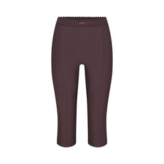 SKIMS BODY HIGH-WAISTED CAPRI | RAISIN FLAT ON A WHITE BACKGROUND | FLT