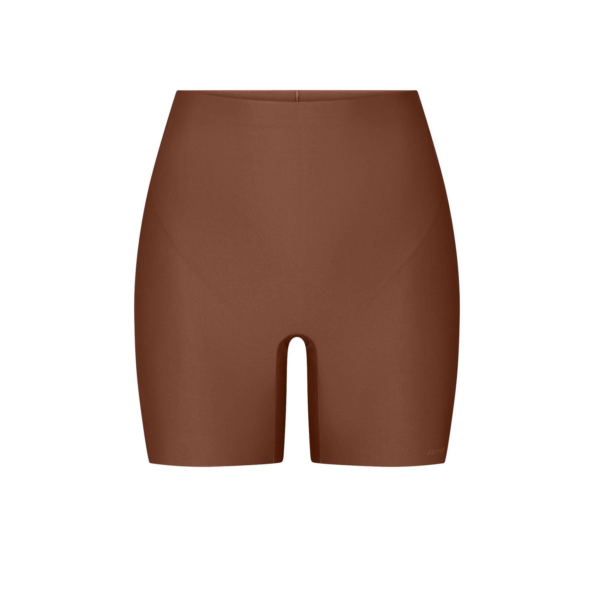 SKIMS BODY CORE SCULPT SHORTIE | JASPER FLAT ON A WHITE BACKGROUND | FLT