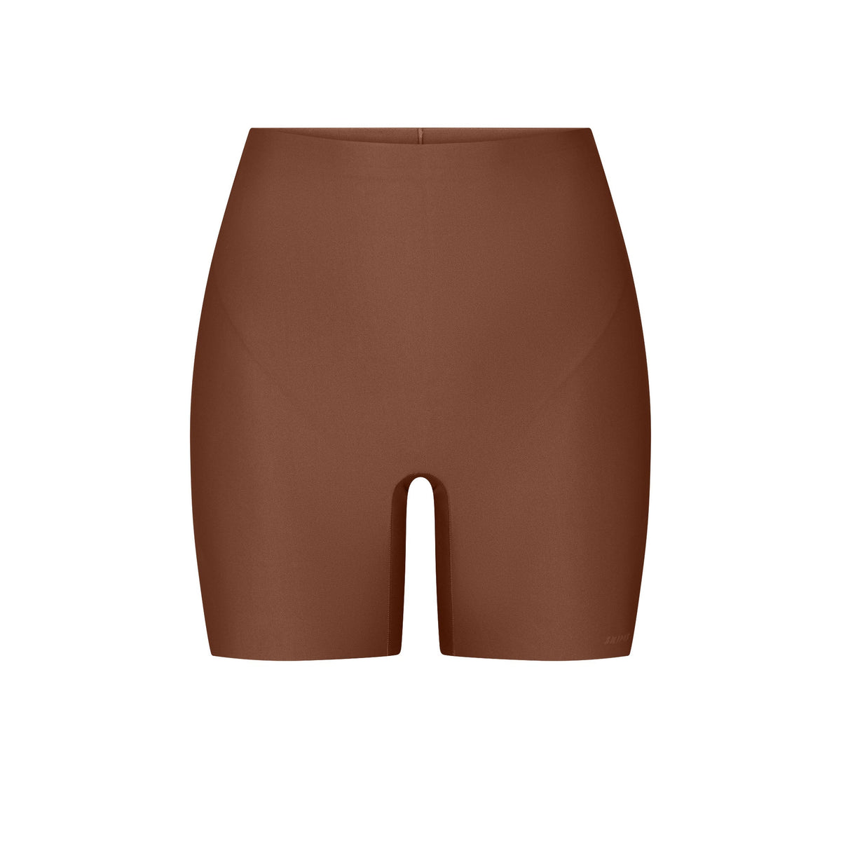 SKIMS BODY CORE SCULPT SHORTIE | JASPER FLAT ON A WHITE BACKGROUND | FLT