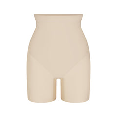 SKIMS BODY CORE SCULPT MID RISE SHORT | SAND FLAT ON A WHITE BACKGROUND | FLT | FLT