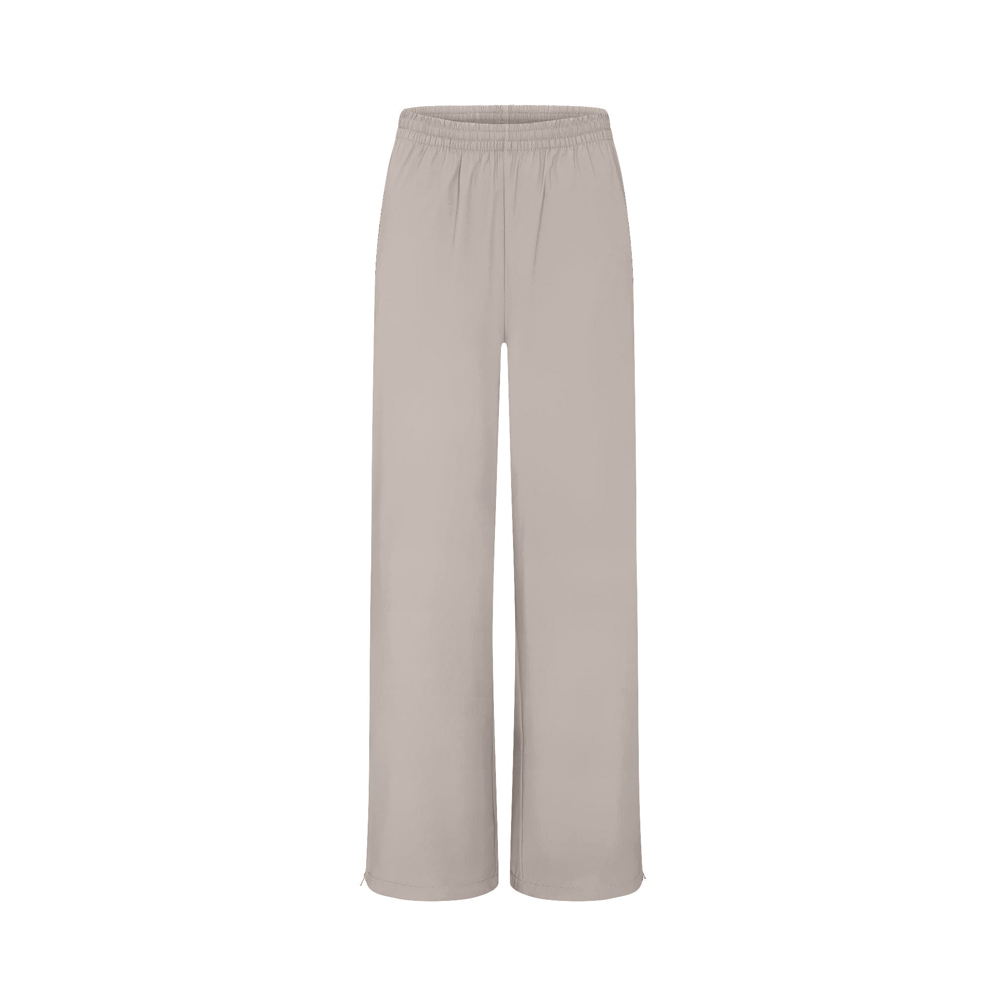 NikeSKIMS WOVEN NYLON OVERSIZED TRACK PANT | STONE FLAT ON A WHITE BACKGROUND | FLT