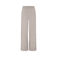 NikeSKIMS WOVEN NYLON OVERSIZED TRACK PANT | STONE FLAT ON A WHITE BACKGROUND | FLT