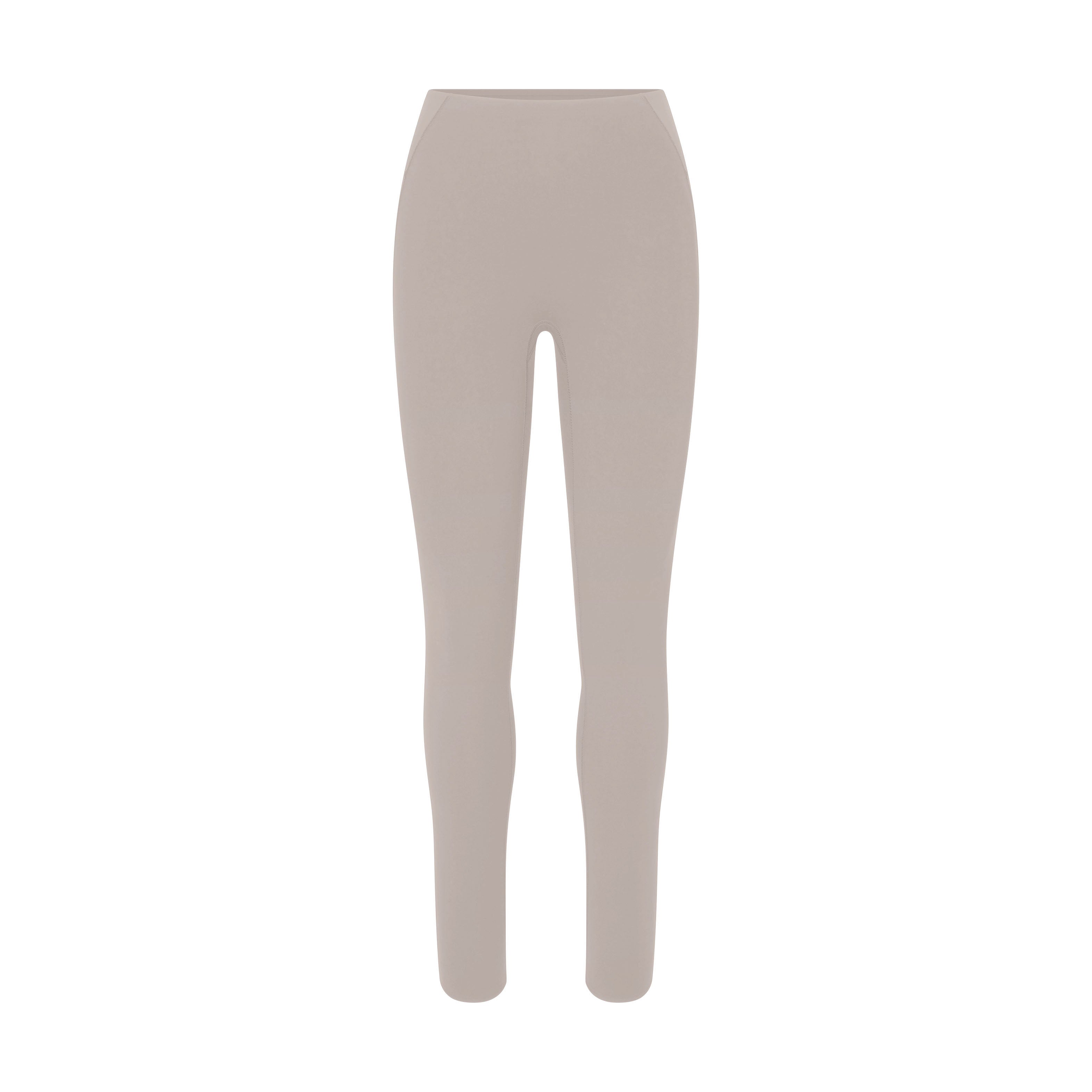 NikeSKIMS STUDIO STRETCH 26" LEGGING | LINEN LAYS FLAT ON A WHITE BACKGROUND | FLT