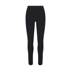 NikeSKIMS STUDIO STRETCH 26" LEGGING | OBSIDIAN LAYS FLAT ON A WHITE BACKGROUND | FLT