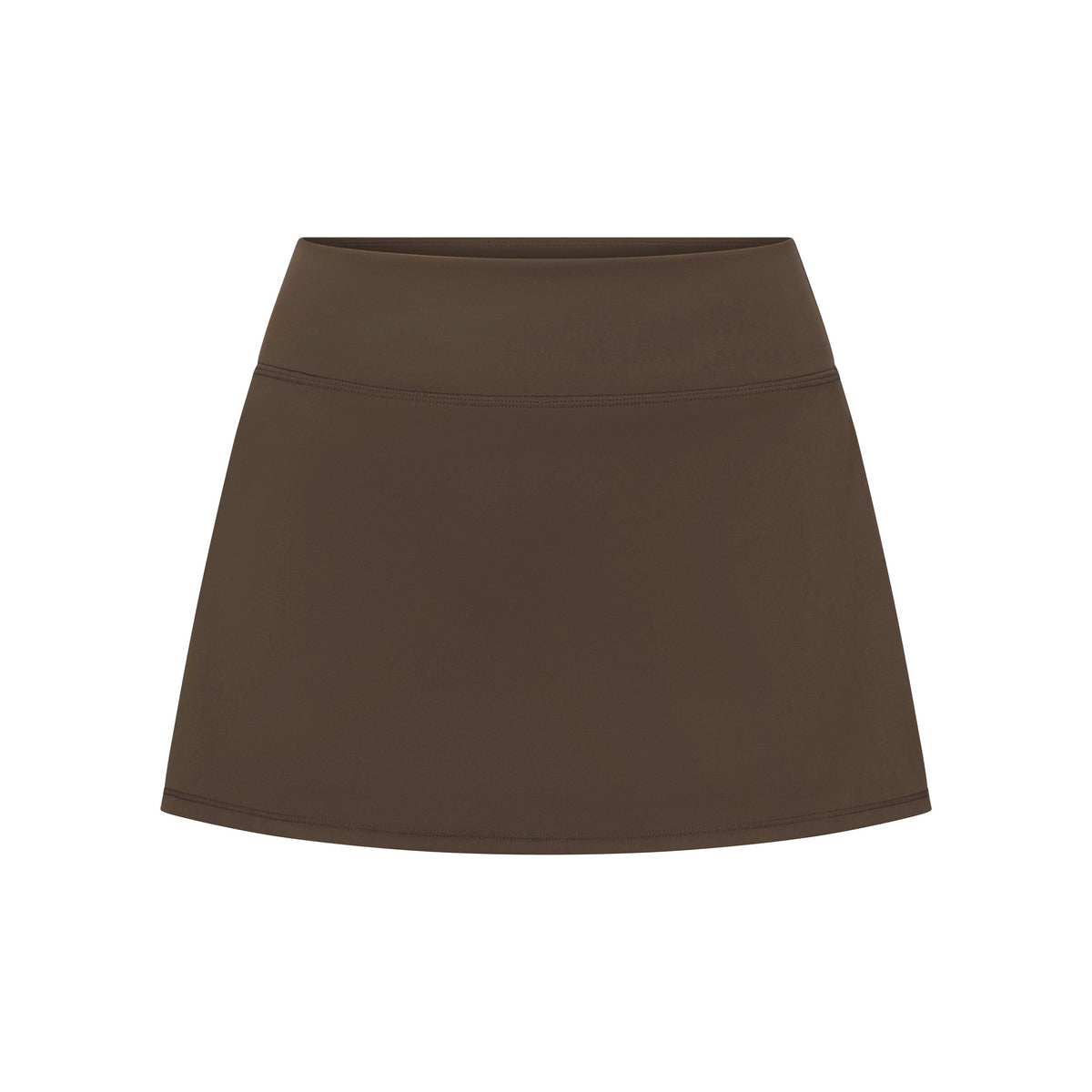 NikeSKIMS MATTE SKORT | NSKM DARK SEPIA LAYS FLAT ON A WHITE BACKGROUND | FLT
