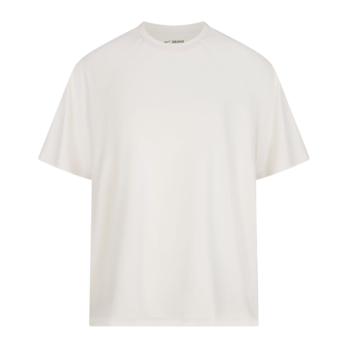 NikeSKIMS AIRY OVERSIZED TEE | IVORY LAYS FLAT ON A WHITE BACKGROUND | FLT