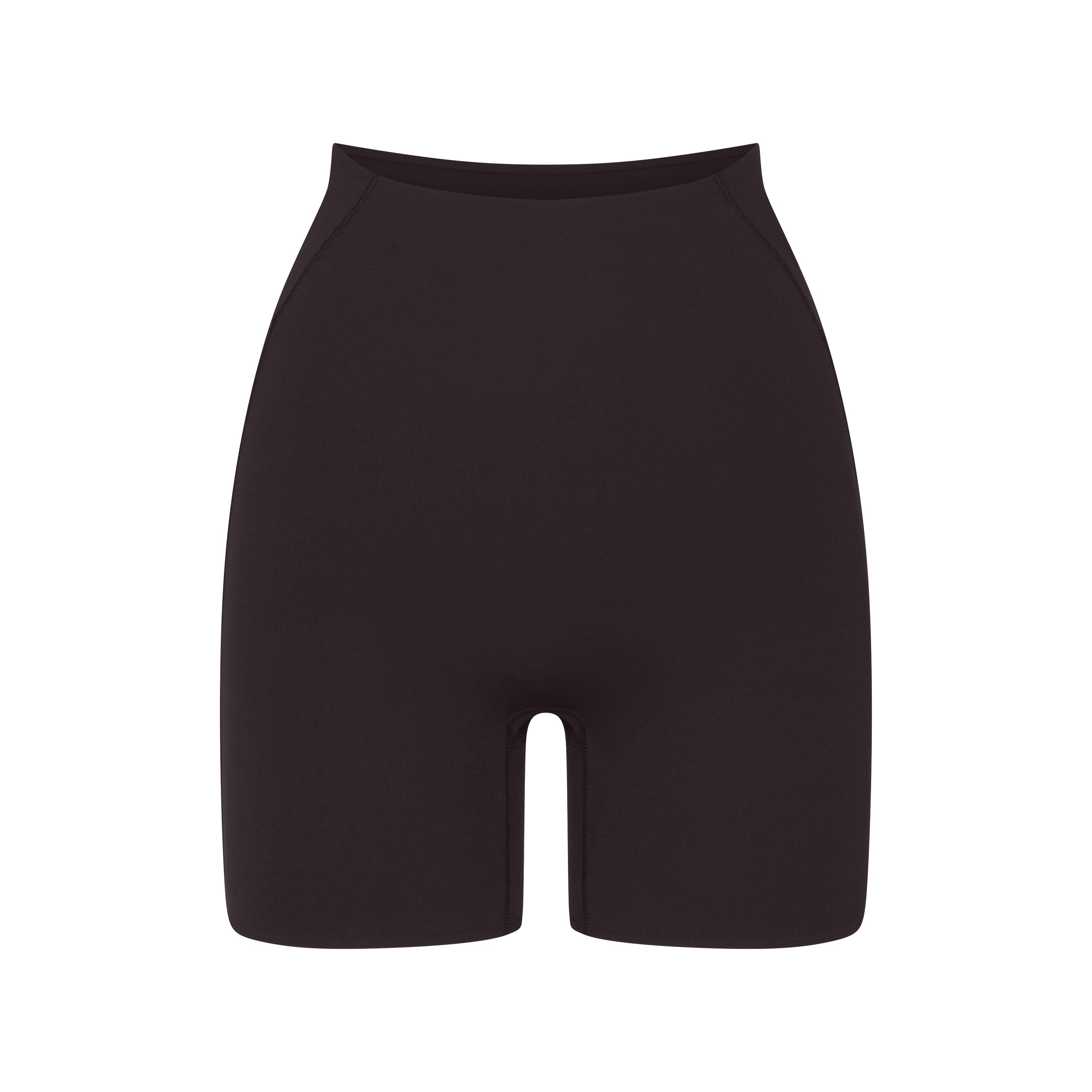 NikeSKIMS STUDIO STRETCH 5" BIKER SHORT | DARK ROAST LAYS FLAT ON A WHITE BACKGROUND | FLT