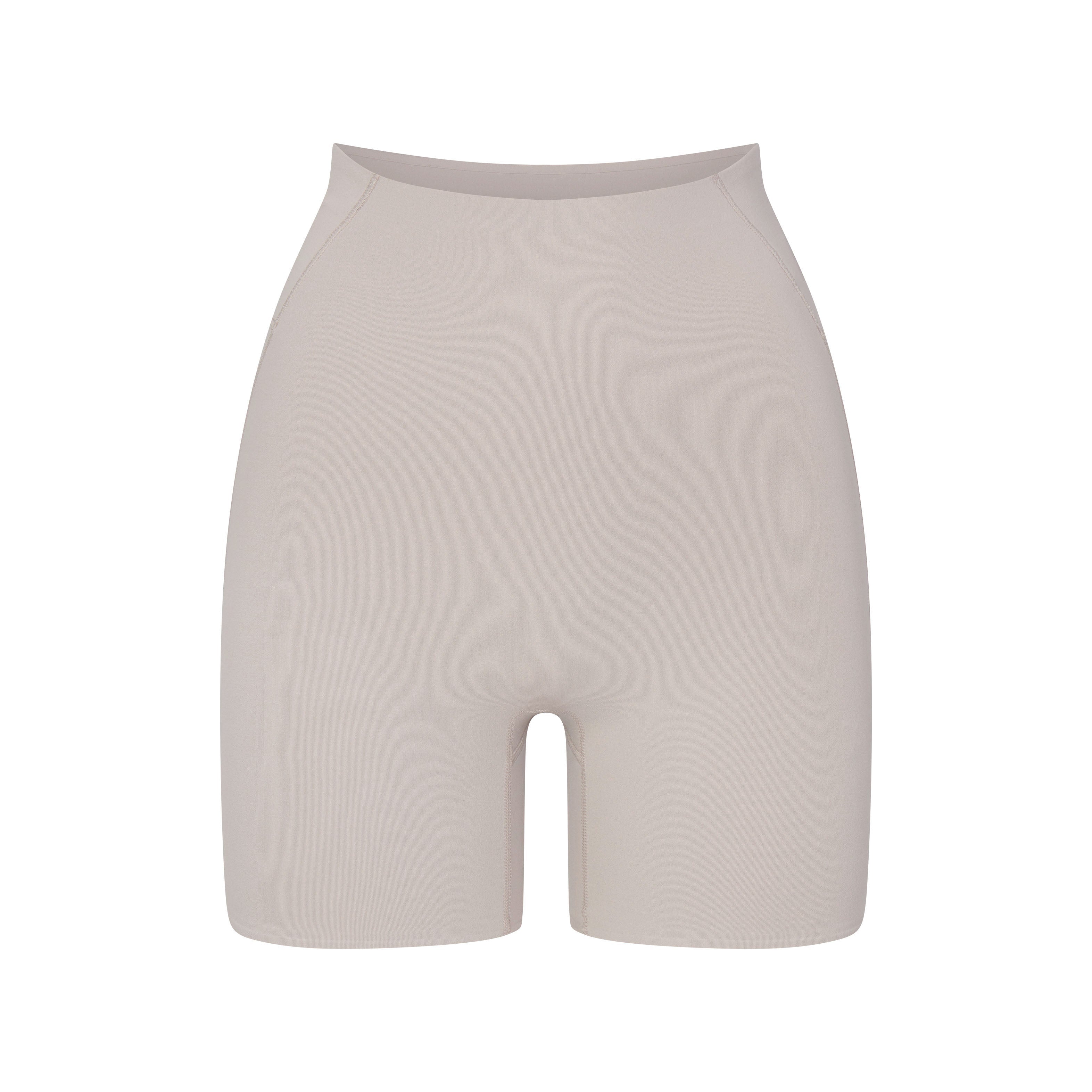 NikeSKIMS STUDIO STRETCH 5" BIKER SHORT | LINEN LAYS FLAT ON A WHITE BACKGROUND | FLT