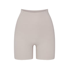 NikeSKIMS STUDIO STRETCH 5" BIKER SHORT | LINEN LAYS FLAT ON A WHITE BACKGROUND | FLT