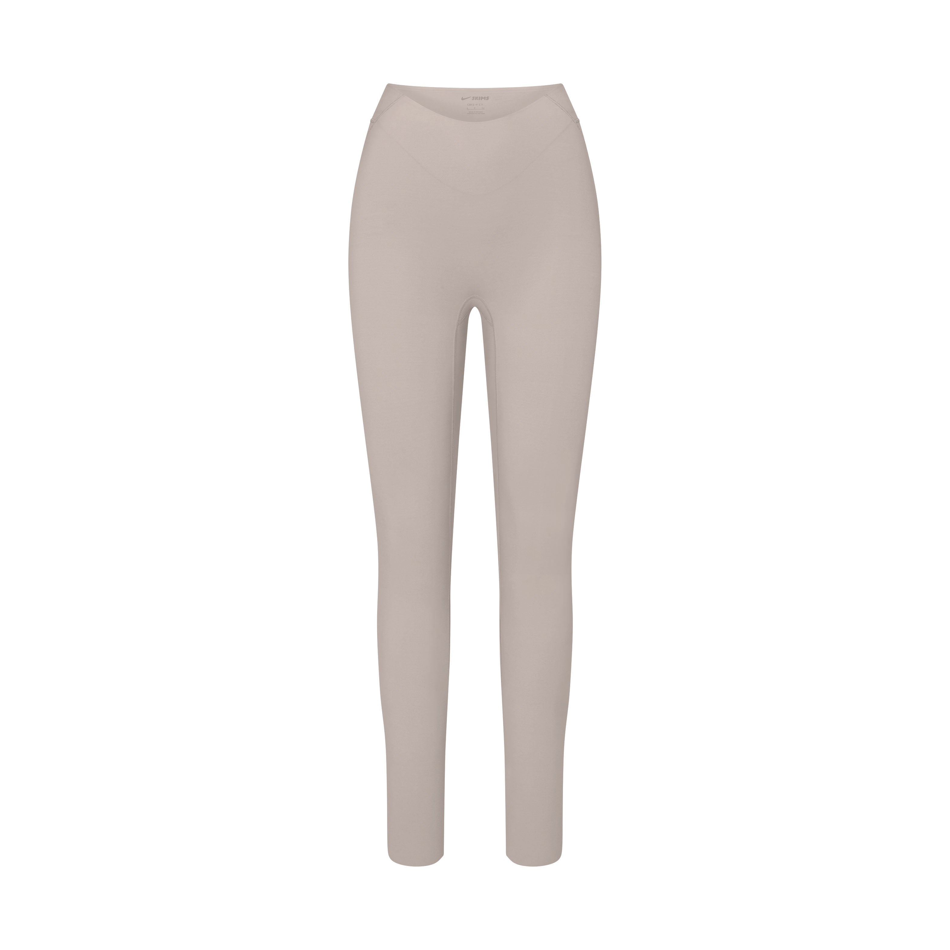 NikeSKIMS STUDIO STRETCH DIPPED 29" LEGGING | LINEN LAYS FLAT ON A WHITE BACKGROUND | FLT