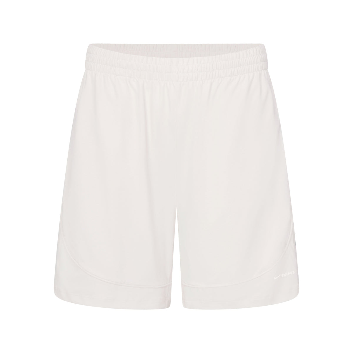 NikeSKIMS AIRY RELAXED SHORT | IVORY LAYS FLAT ON A WHITE BACKGROUND | FLT