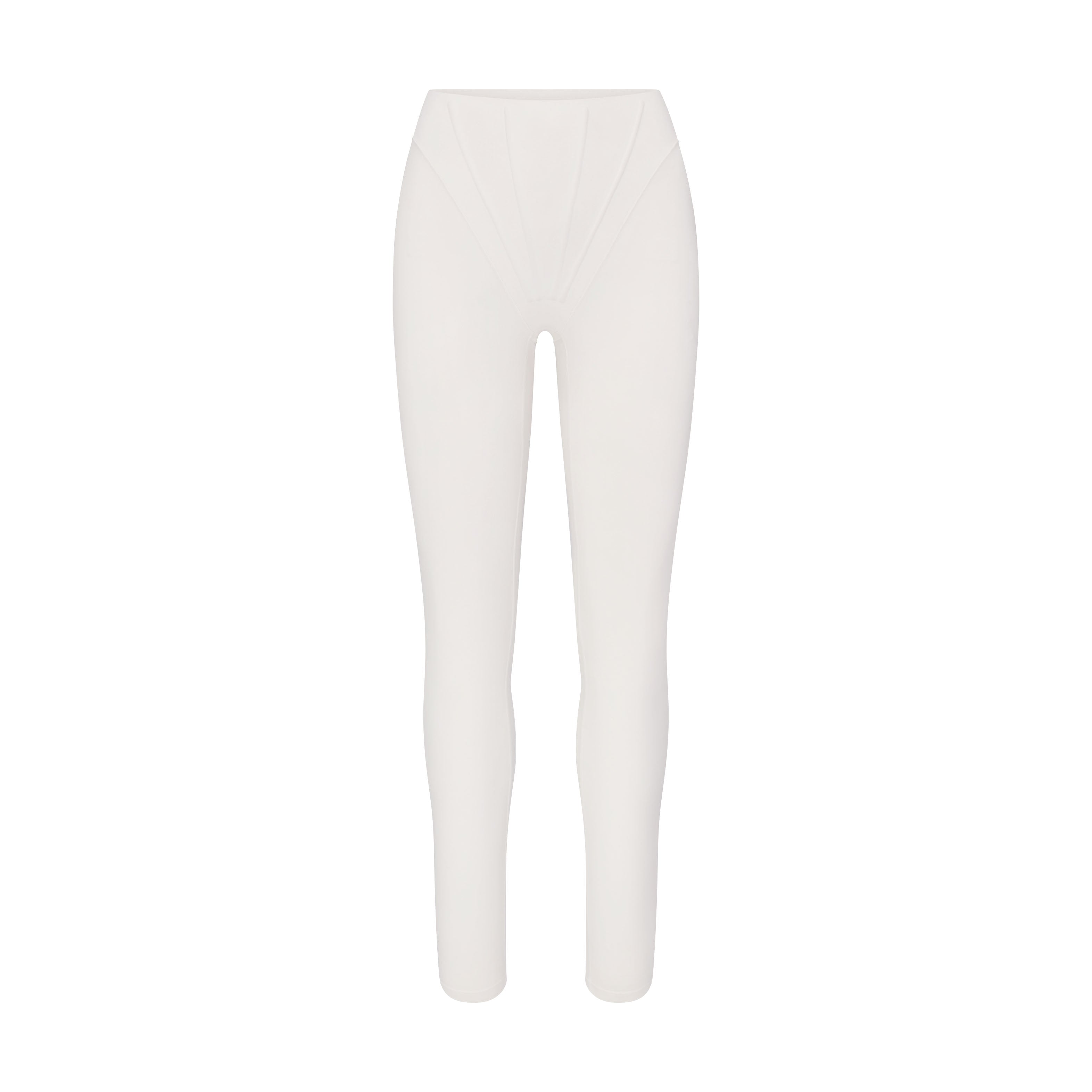 NikeSKIMS MATTE HIGH WAIST CORSET 26" LEGGING | IVORY LAYS FLAT ON A WHITE BACKGROUND | FLT