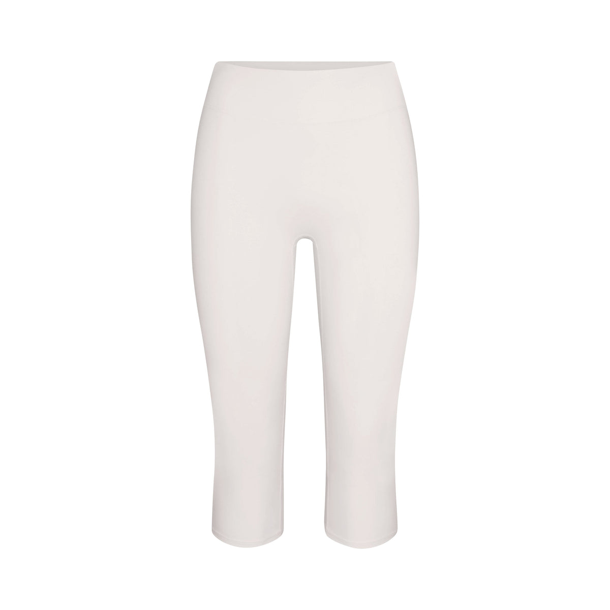 NikeSKIMS MATTE CROP 17" LEGGING | IVORY LAYS FLAT ON A WHITE BACKGROUND | FLT