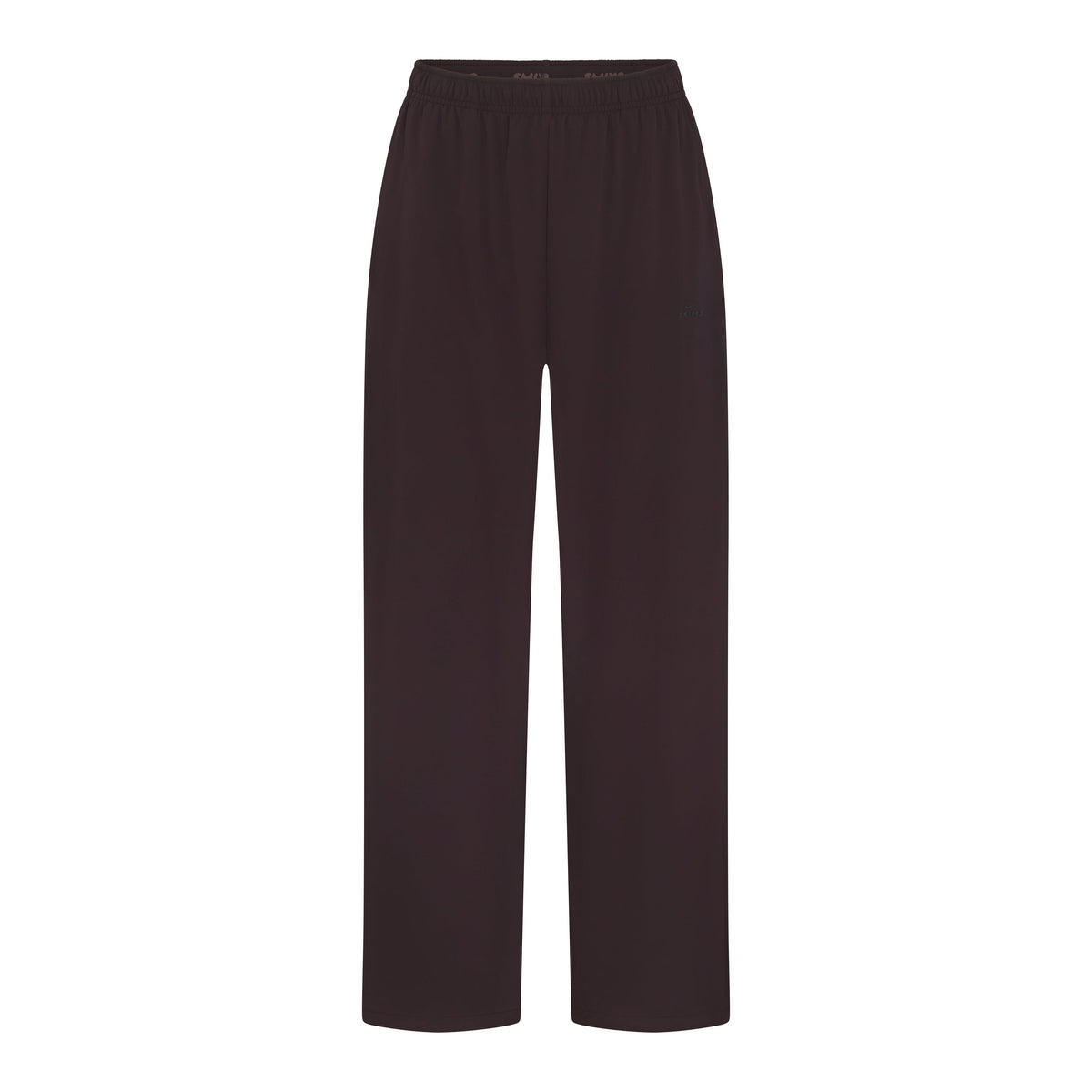 NikeSKIMS STRETCH NYLON OVERSIZED PANT | DARK ROAST & LAYS FLAT ON A WHITE BACKGROUND | FLT