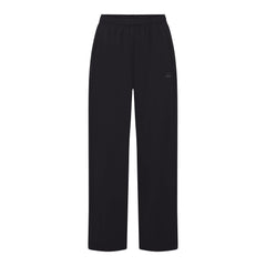 NikeSKIMS STRETCH NYLON OVERSIZED PANT | OBSIDIAN LAYS FLAT ON A WHITE BACKGROUND | FLT