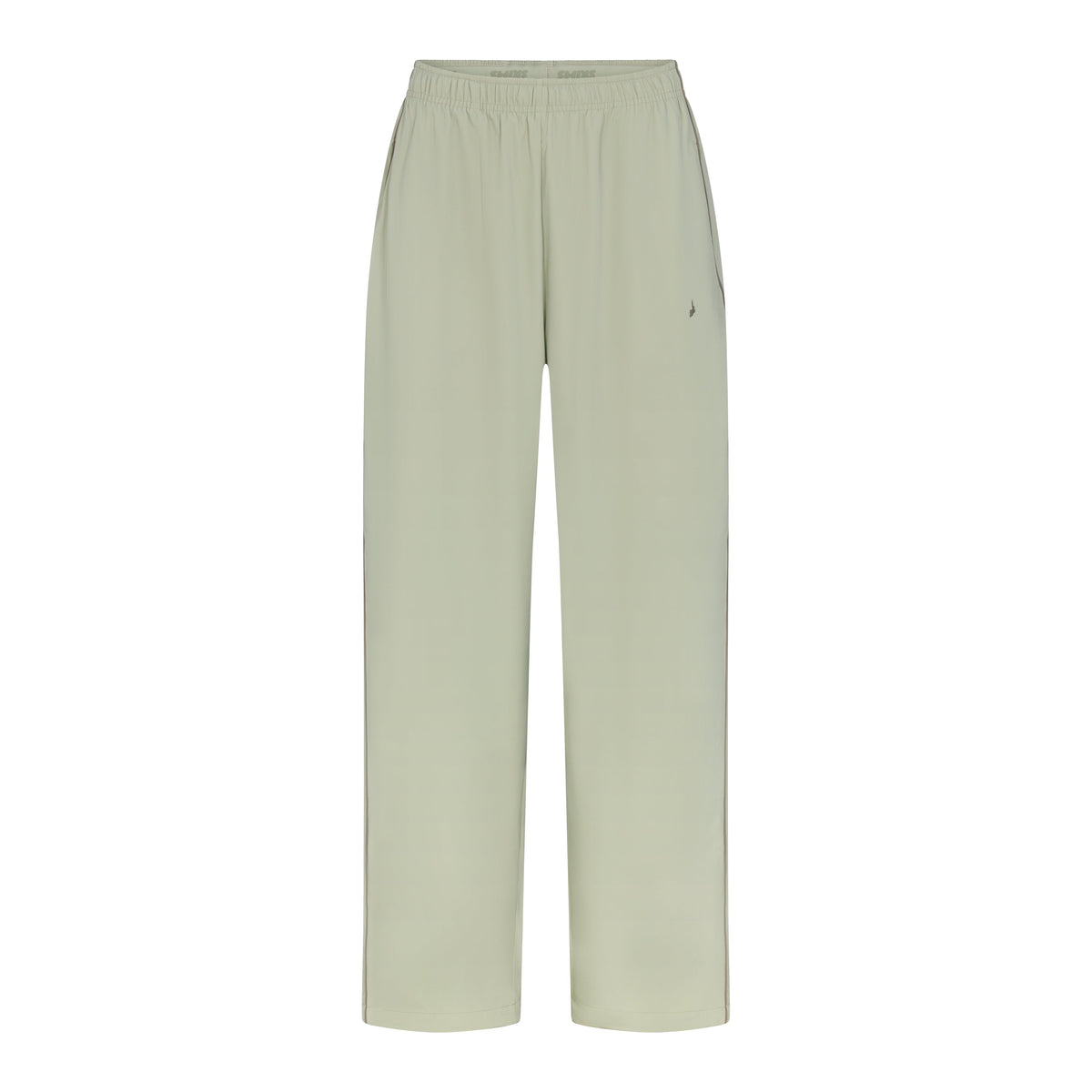 NikeSKIMS STRETCH NYLON OVERSIZED PANT | TALC & LAYS FLAT ON A WHITE BACKGROUND | FLT