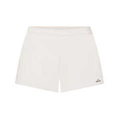 NikeSKIMS STRETCH NYLON RUNNER SHORT | IVORY LAYS FLAT ON A WHITE BACKGROUND | FLT