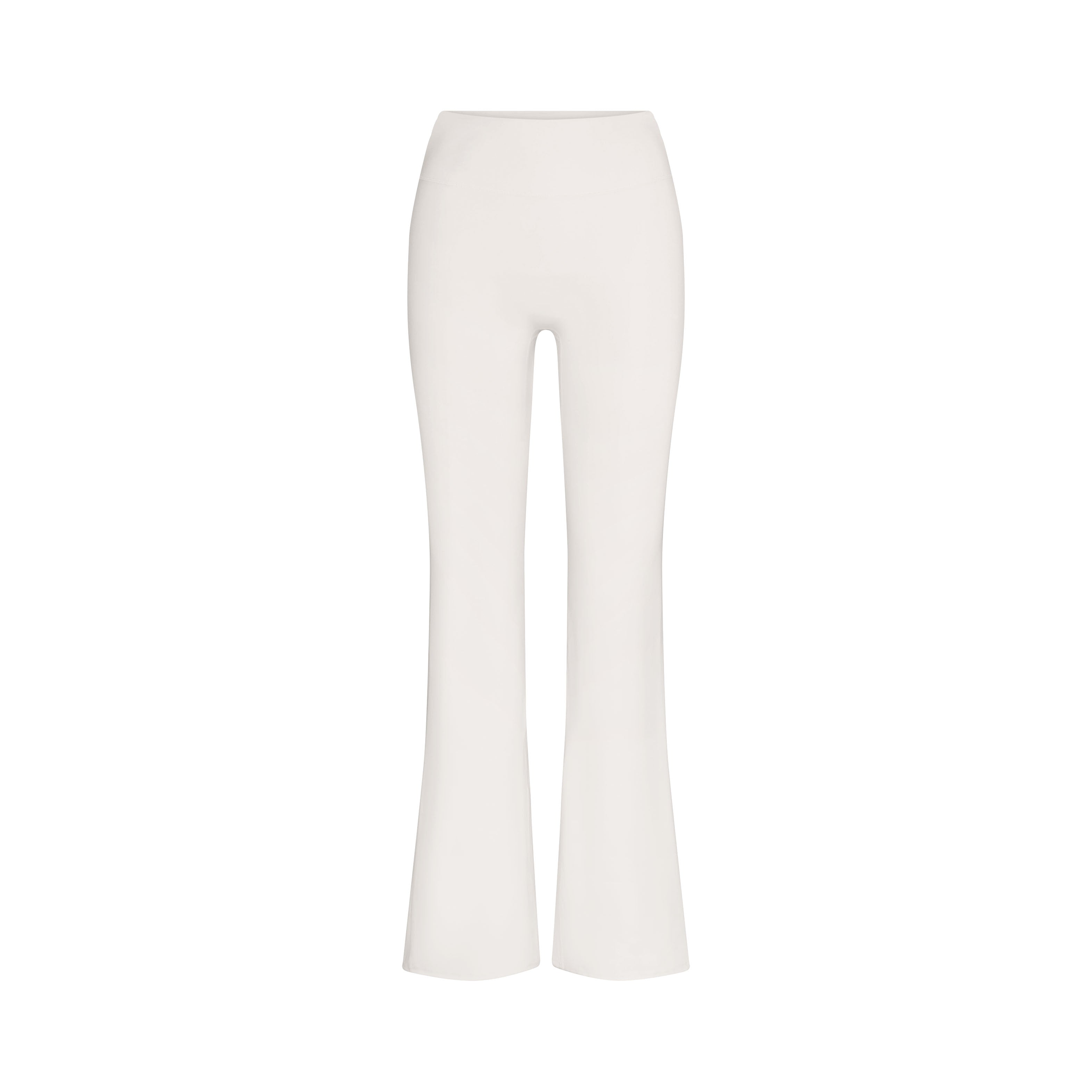 NikeSKIMS MATTE SLIM FLARE LEGGING | IVORY LAYS FLAT ON A WHITE BACKGROUND | FLT