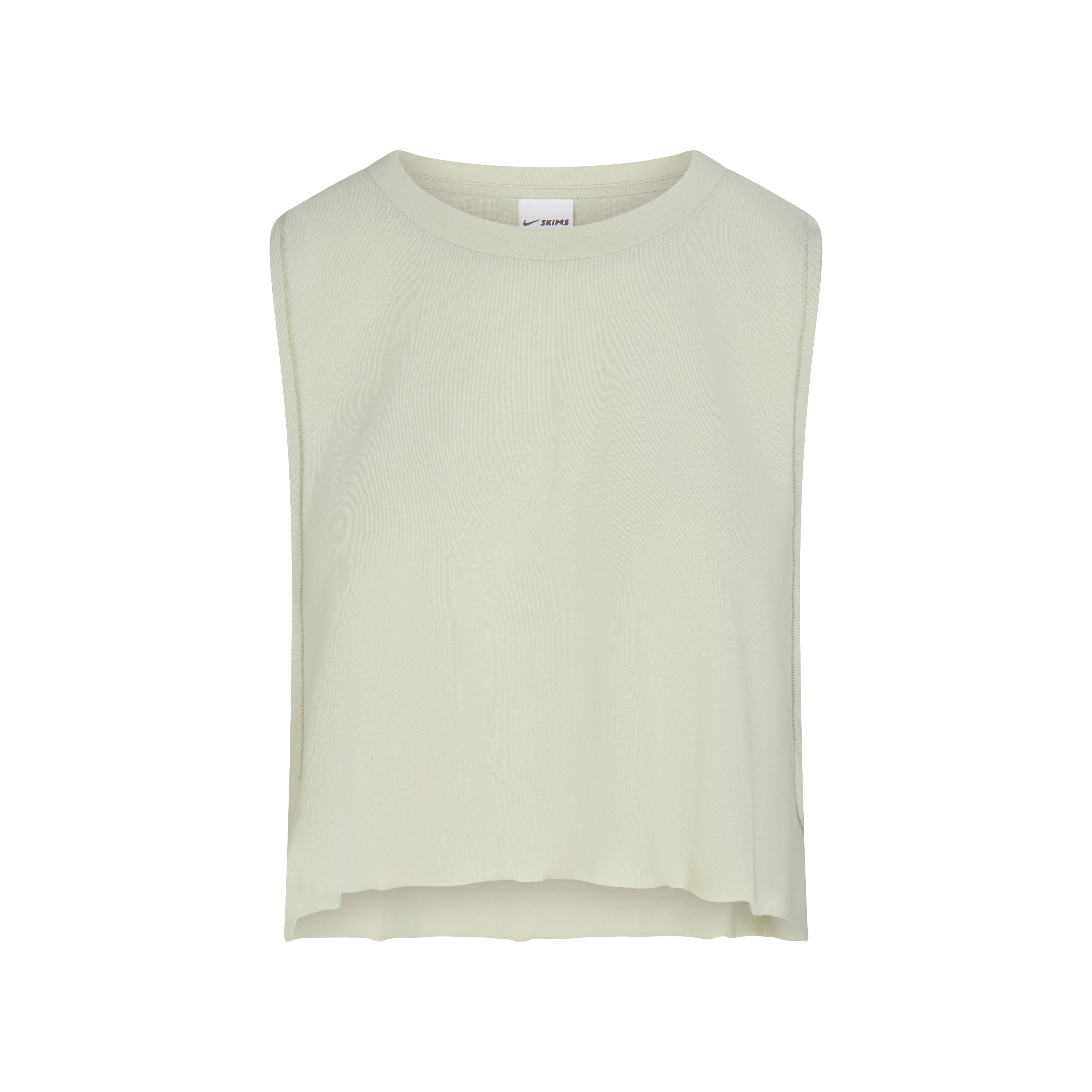 NikeSKIMS PERFORMANCE COTTON BLEND CROP TANK | TALC & LAYS FLAT ON A WHITE BACKGROUND | FLT