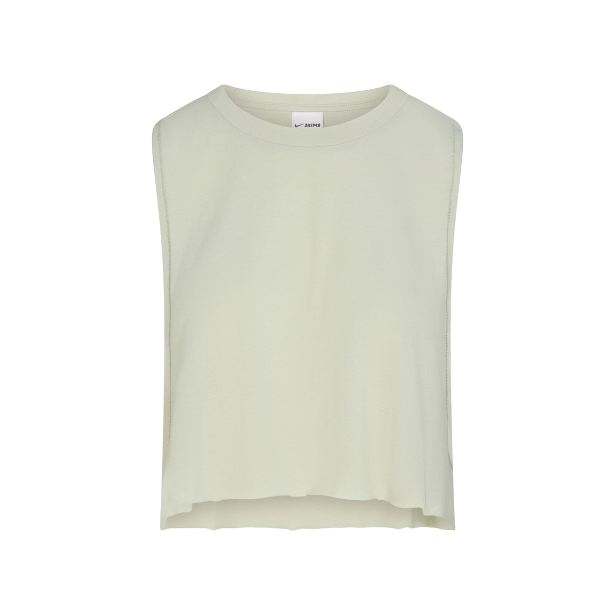 NikeSKIMS PERFORMANCE COTTON BLEND CROP TANK | TALC & LAYS FLAT ON A WHITE BACKGROUND | FLT