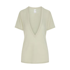 NikeSKIMS PERFORMANCE COTTON BLEND SHORT SLEEVE V-NECK TOP | TALC & LAYS FLAT ON A WHITE BACKGROUND | FLT