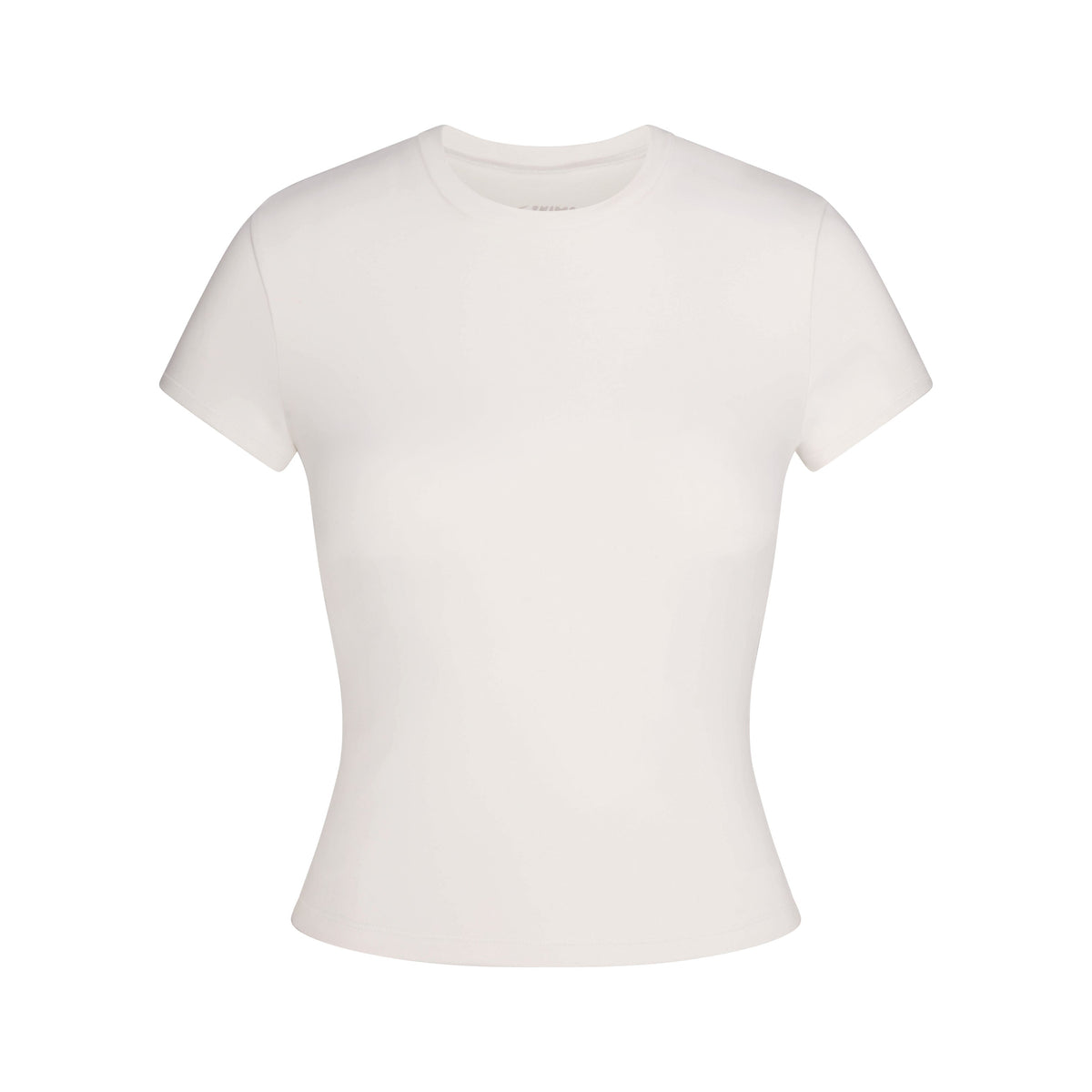 NikeSKIMS MATTE PADDED BABY TEE | IVORY LAYS FLAT ON A WHITE BACKGROUND | FLT