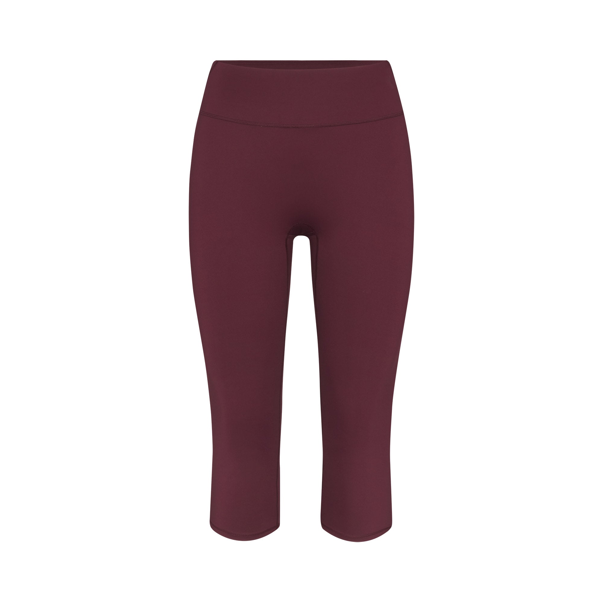 NikeSKIMS MATTE CROP 17" LEGGING | CURRANT FLAT ON A WHITE BACKGROUND | FLT