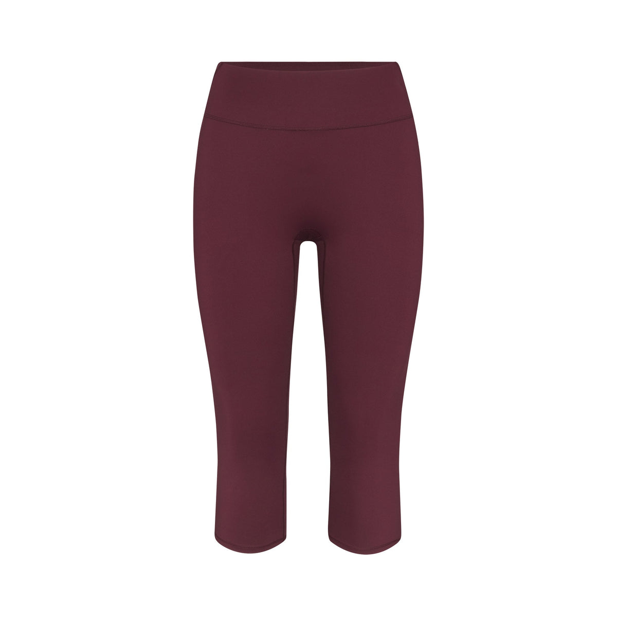NikeSKIMS MATTE CROP 17" LEGGING | CURRANT FLAT ON A WHITE BACKGROUND | FLT
