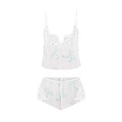 SKIMS ROMANCE CAMI AND SHORT SET | IVORY PEARL BOWS PRINT FLAT ON A WHITE BACKGROUND | FLT