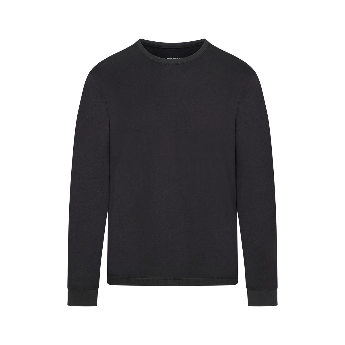 SKIMS COTTON MENS CLASSIC LONG SLEEVE T SHIRT ONYX FLAT ON A WHITE BACKGROUND | FLT | FLT