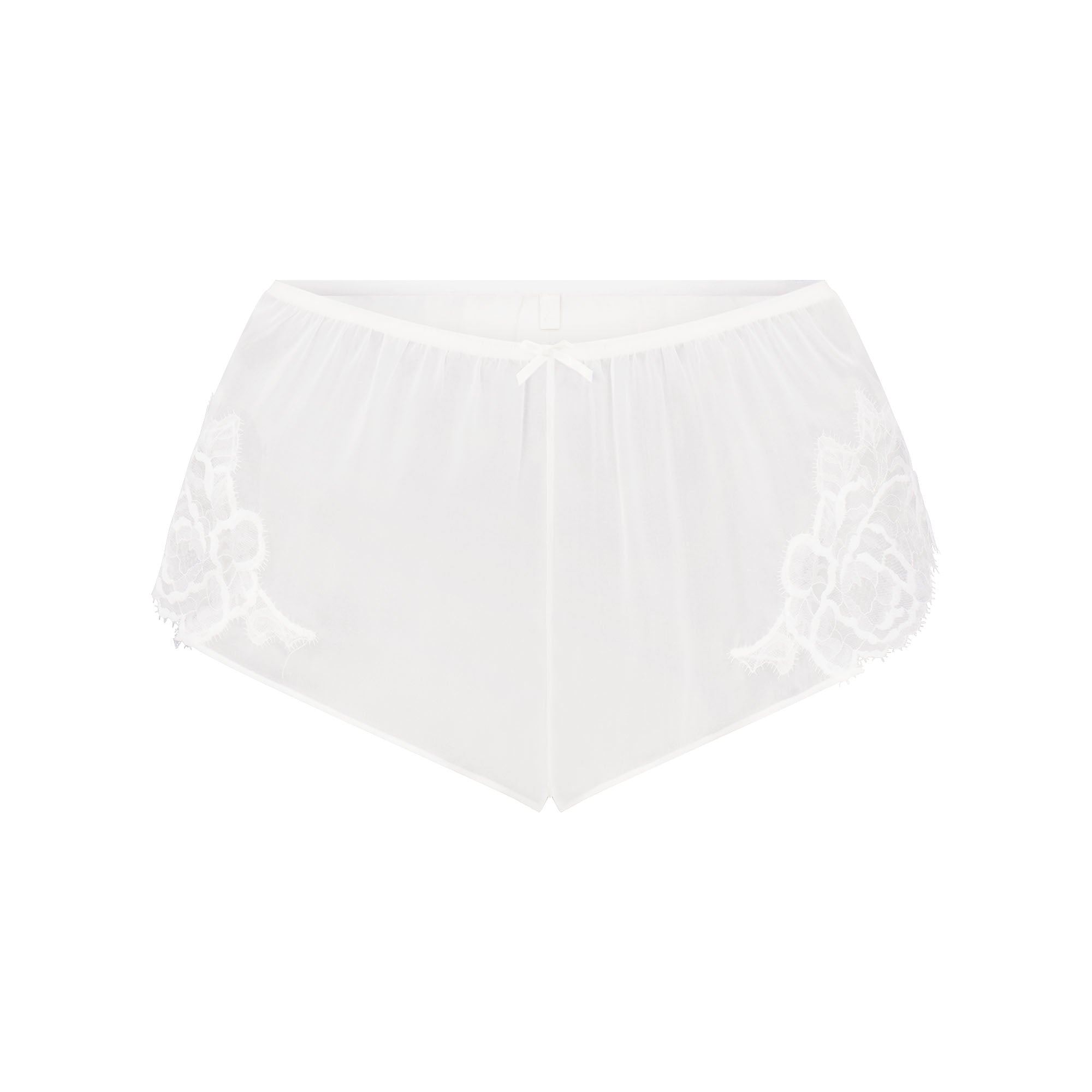 SKIMS ROMANCE CAMI AND SHORT SET | IVORY LAYS FLAT ON A WHITE BACKGROUND | FLT 