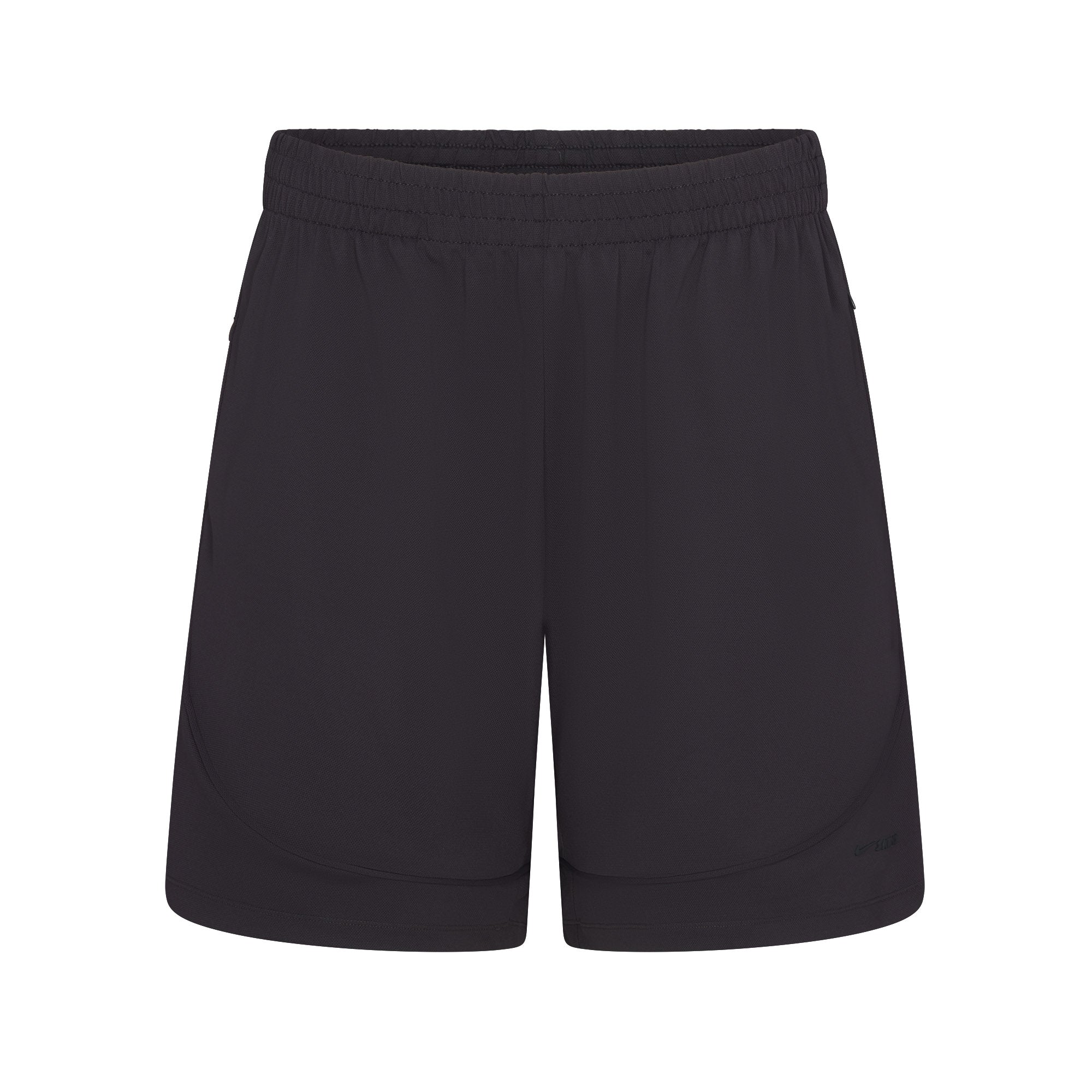 NikeSKIMS AIRY RELAXED SHORT | NSKM OBSIDIAN LAYS FLAT ON A WHITE BACKGROUND | FLT