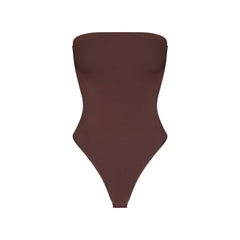 SMOOTH LAYERS STRAPLESS BODYSUIT | COCOA FLAT ON A WHITE BACKGROUND | FLT
