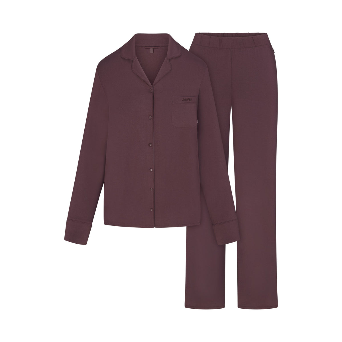 SKIMS SLEEP LONG SLEEVE BUTTON UP SET | RAISIN FLAT ON A WHITE BACKGROUND | FLT