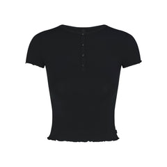 SKIMS SLEEP HENLEY AND FOLDOVER SHORT SET | ONYX FLAT ON A WHITE BACKGROUND | FLT