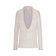 SLINKY KNIT DEEP PLUNGE TOP | BUFF FLAT ON A WHITE BACKGROUND | FLT