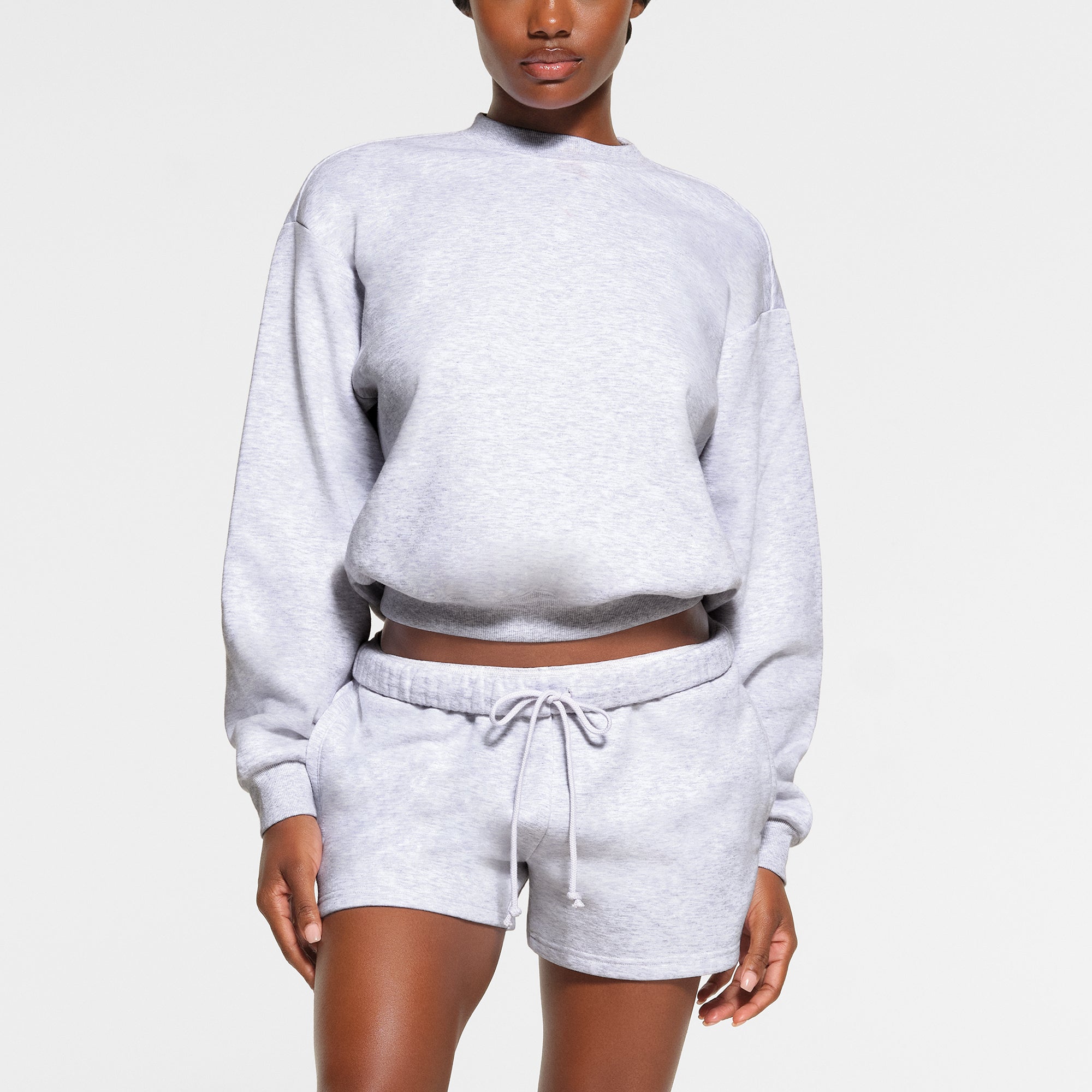 COTTON FLEECE CLASSIC CREWNECK WORN BY A MODEL IN FRONT VIEW