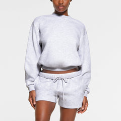 COTTON FLEECE CLASSIC CREWNECK WORN BY A MODEL IN FRONT VIEW