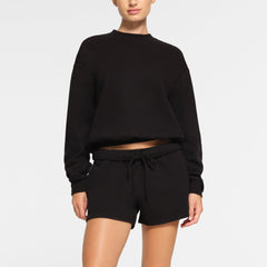 COTTON FLEECE CLASSIC CREWNECK WORN BY A MODEL IN FRONT VIEW