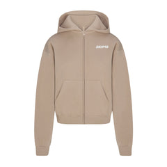 COTTON FLEECE ZIP UP HOODIE WITH EMBOSSED LOGO | LATTE FLAT ON A WHITE BACKGROUND | FLT