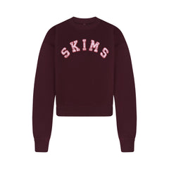COTTON FLEECE CLASSIC CREWNECK | CURRANT ARCHED SKIMS PLAID & LAYS FLAT ON A WHITE BACKGROUND | FLT