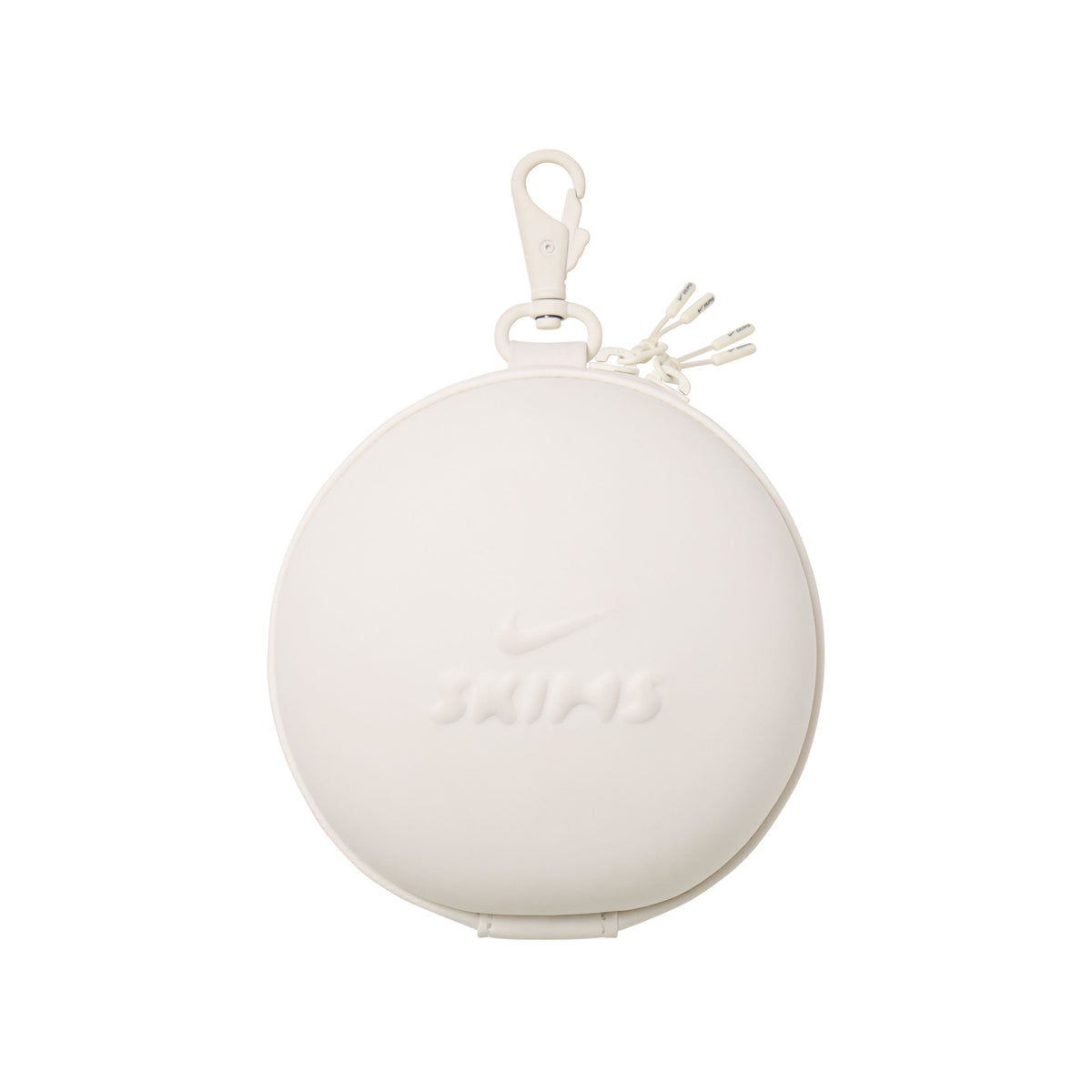 NikeSKIMS ACCESSORIES HARDSHELL ROUND CASE | IVORY LAYS FLAT ON A WHITE BACKGROUND