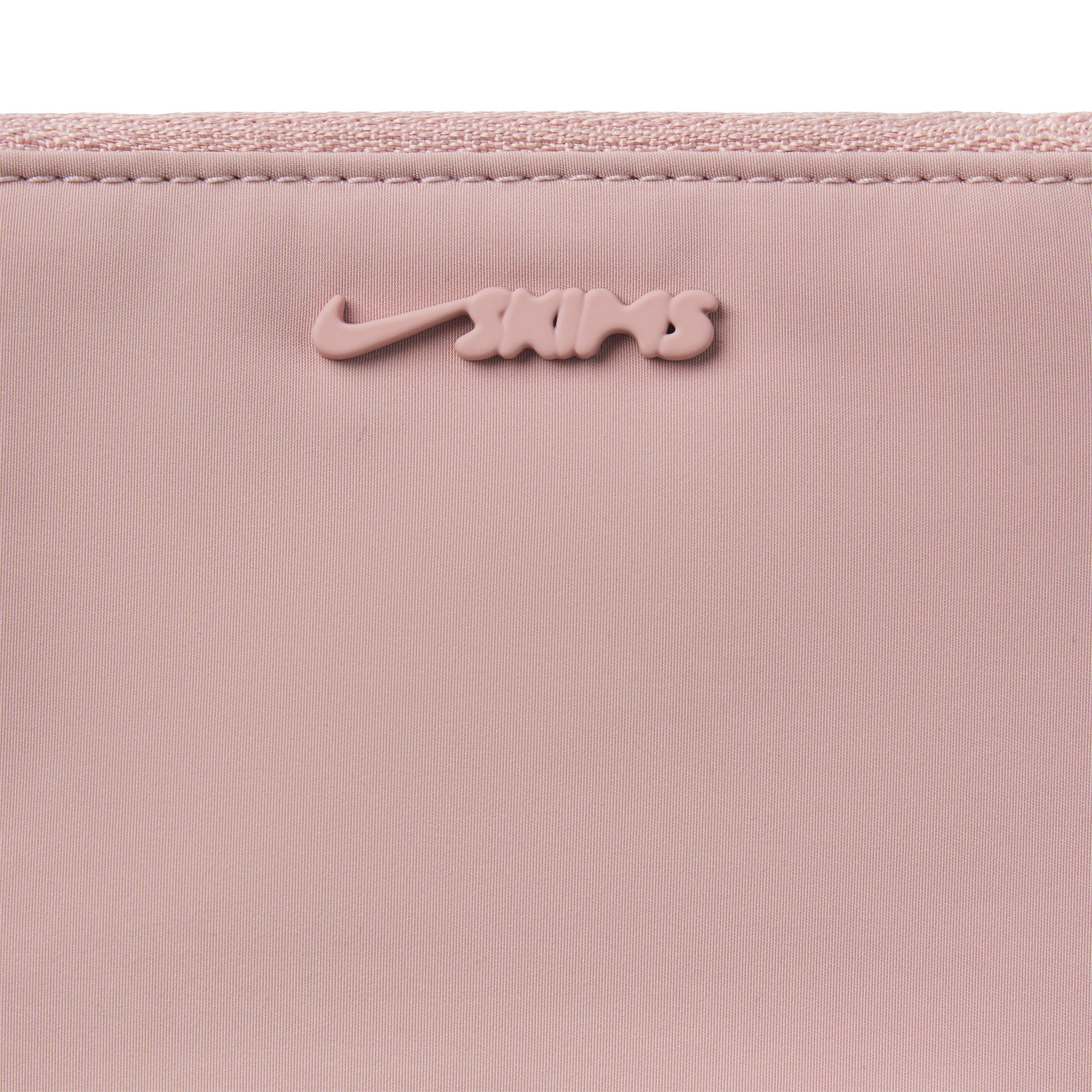 NikeSKIMS ACCESSORIES CLIPPABLE POUCH | HIMALAYAN FLAT ON A WHITE BACKGROUND