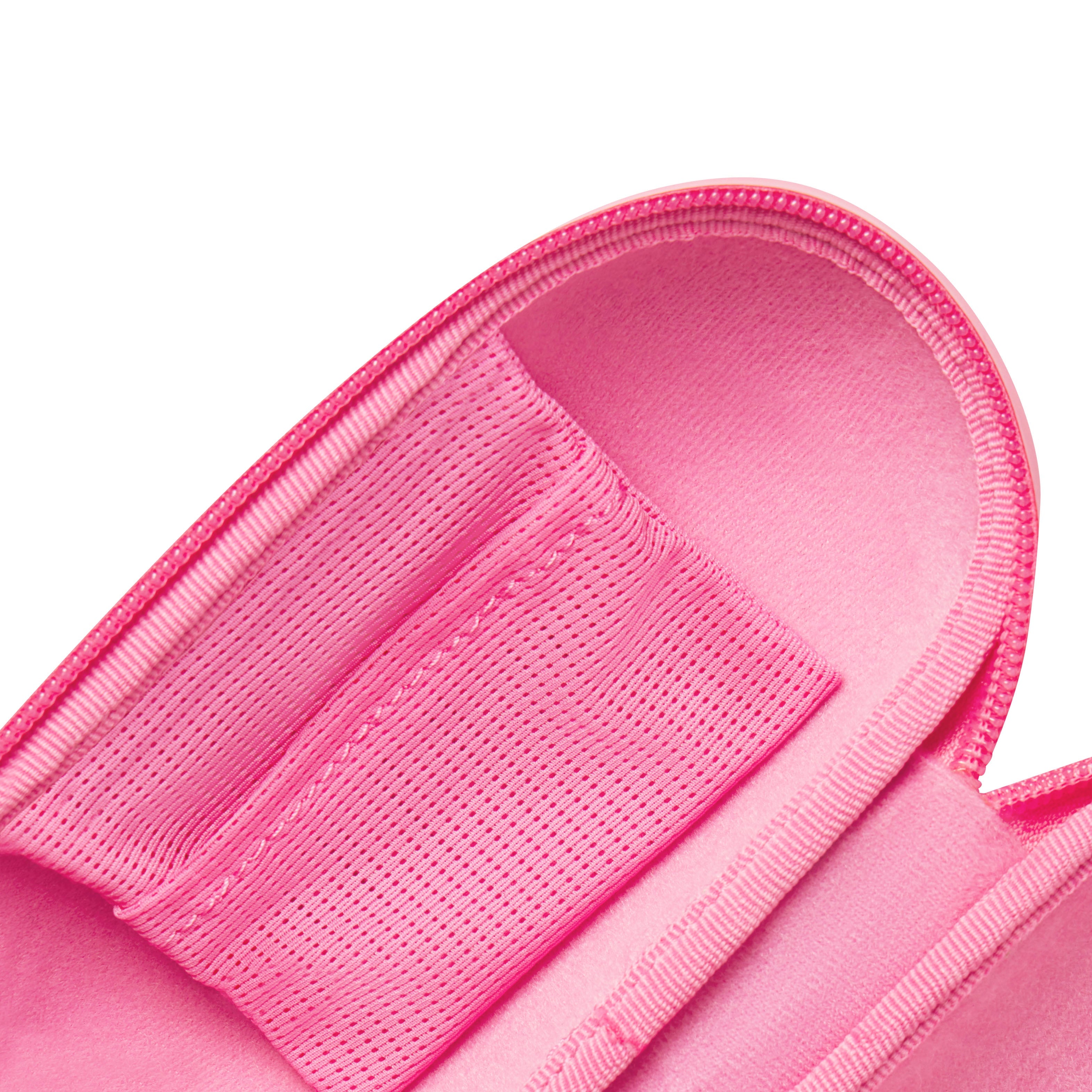 NikeSKIMS ACCESSORIES HARDSHELL GLASSES CASE | LIGHT FLAMINGOON A MODEL 